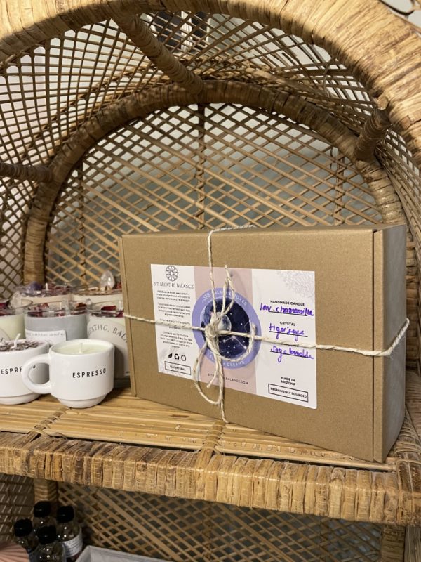Smudge Kit Sitting on Rattan Shelf next to Candles - SBB
