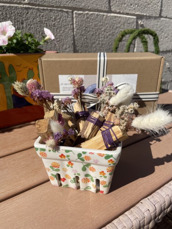 Ceramic Fruit Carton holding Palo Santo Bundles wrapped with Dried Flowers - Sit, Breathe, Balance.