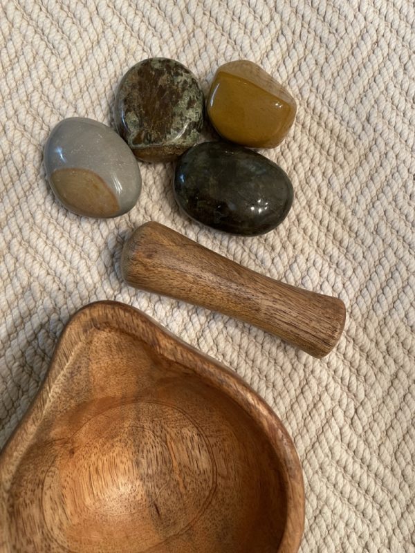 Wooden Mortar Pestle Set with Pestle Next to Palm Stones and Bowl showing Spout for Pouring - SBB