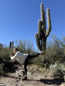 Girl Doing Yoga Pose with lLeg Out and Praying Hands - Cactus in Background - SBB